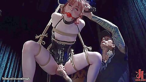 Gagged Ginger Trans Mounted On Sybian